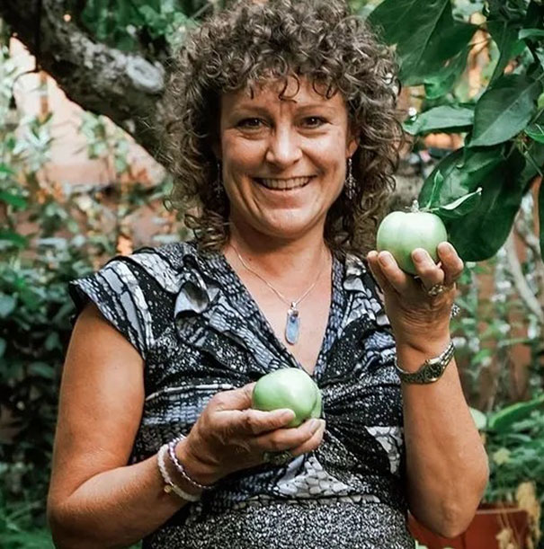 Tracey smiling outdoors